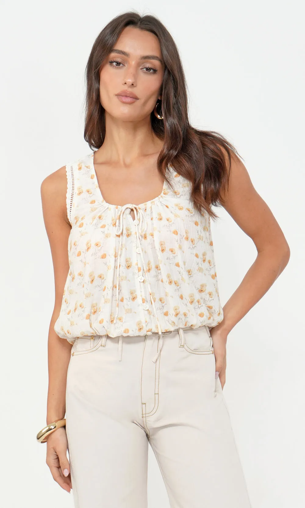 Edna Floral Eyelet Detail Bubble Hem Top sold by Greylin