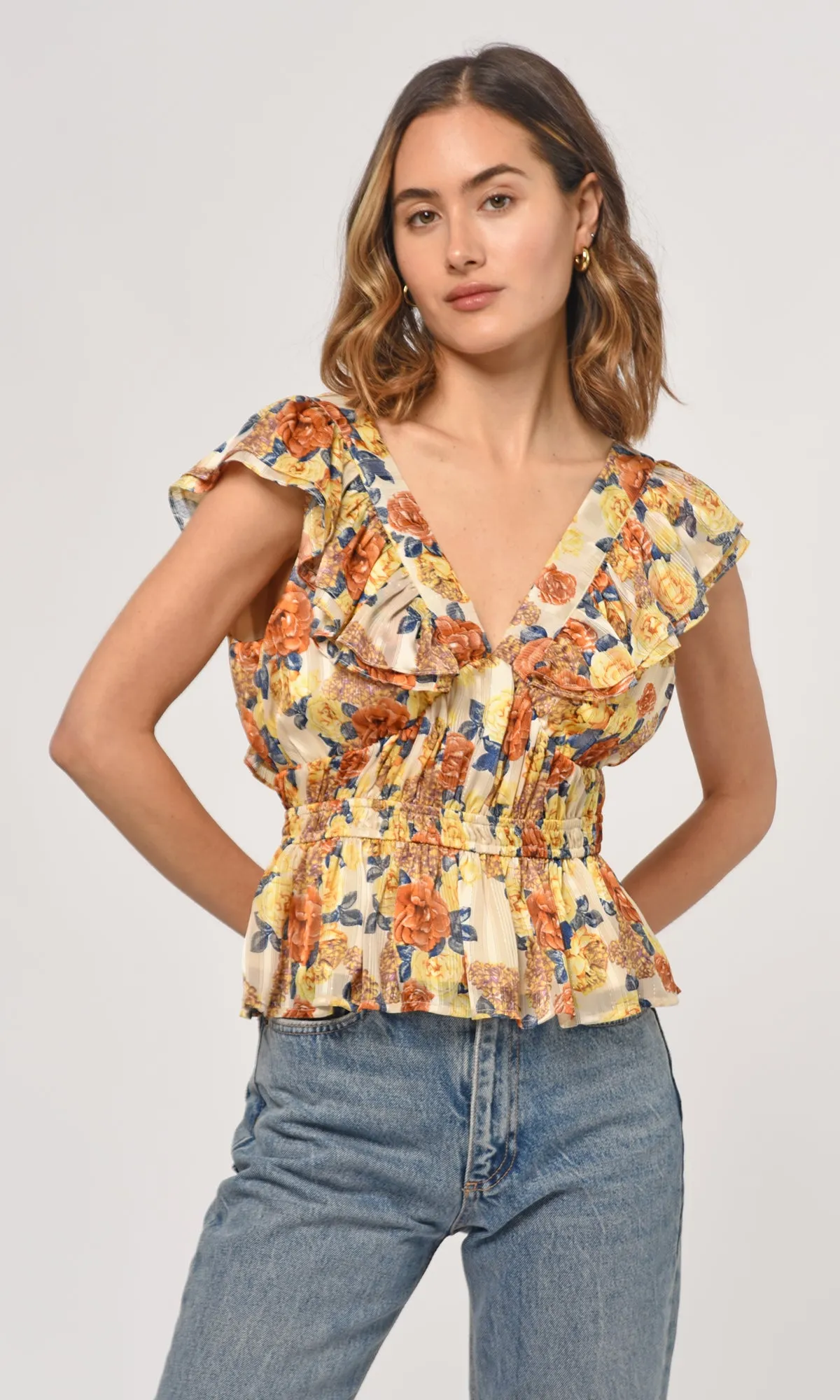 Cladela Ruffled Peplum Top sold by Greylin