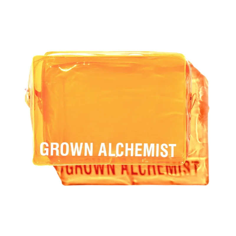 ORANGE TRAVEL BAG made by Grown Alchemist