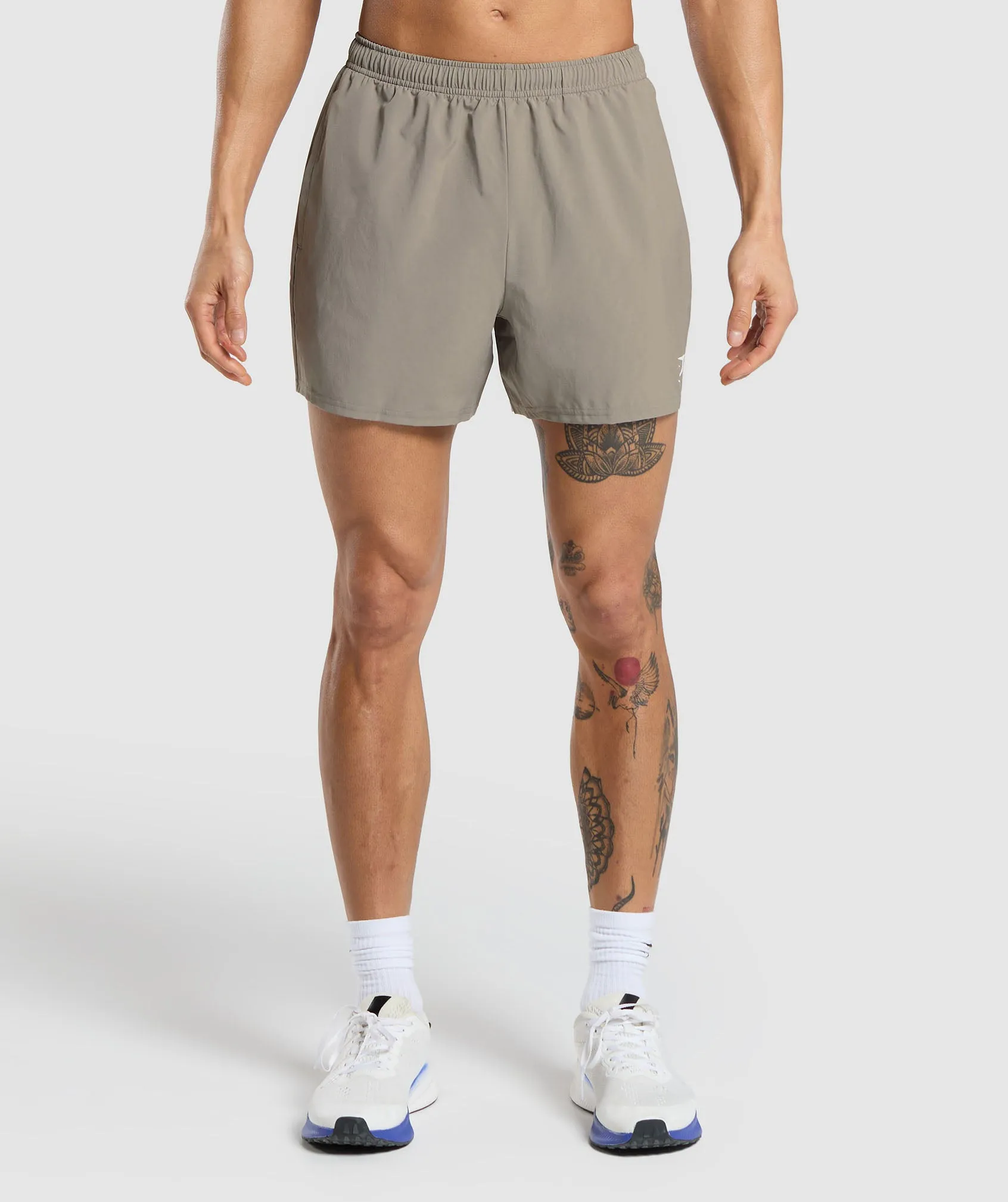 Gymshark Arrival 5" Shorts - Linen Brown sold by Gymshark