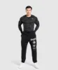 Gymshark Geo Seamless Long Sleeve T-Shirt - Black/Charcoal Grey sold by Gymshark