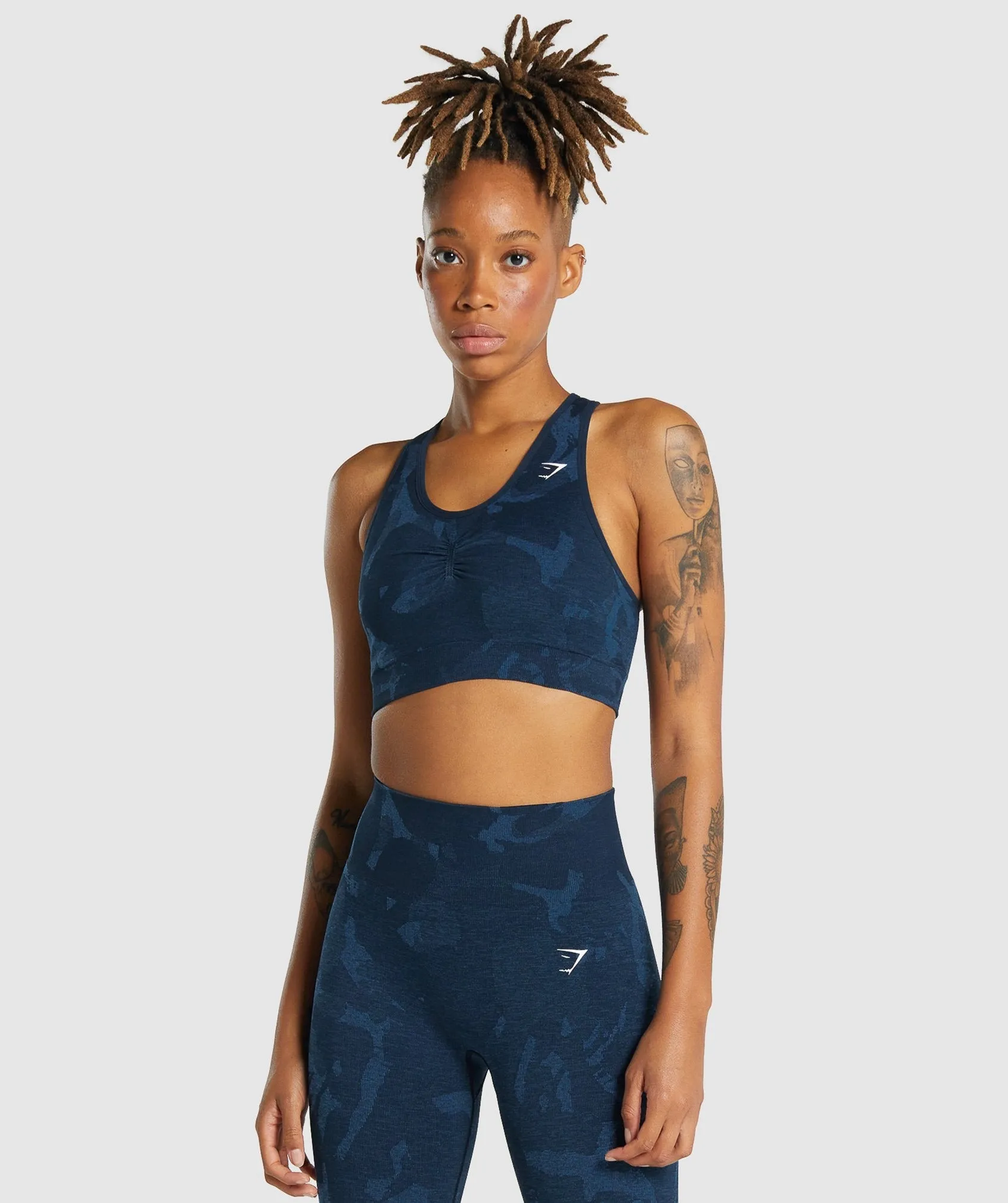 Gymshark Adapt Camo Seamless Racer Back Sports Bra - Savanna | Navy sold by Gymshark