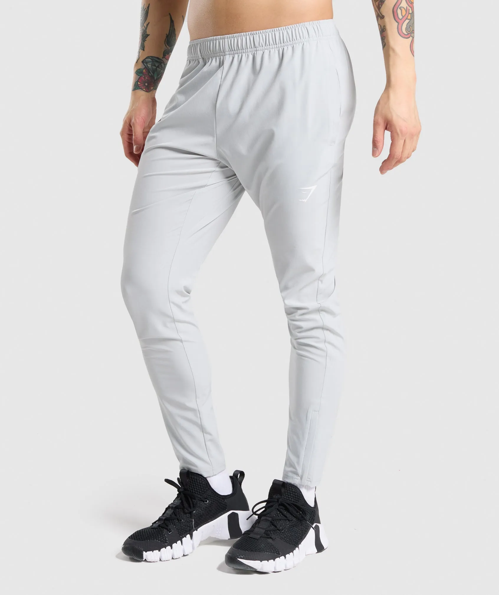 Gymshark Arrival Woven Joggers - Light Grey sold by Gymshark
