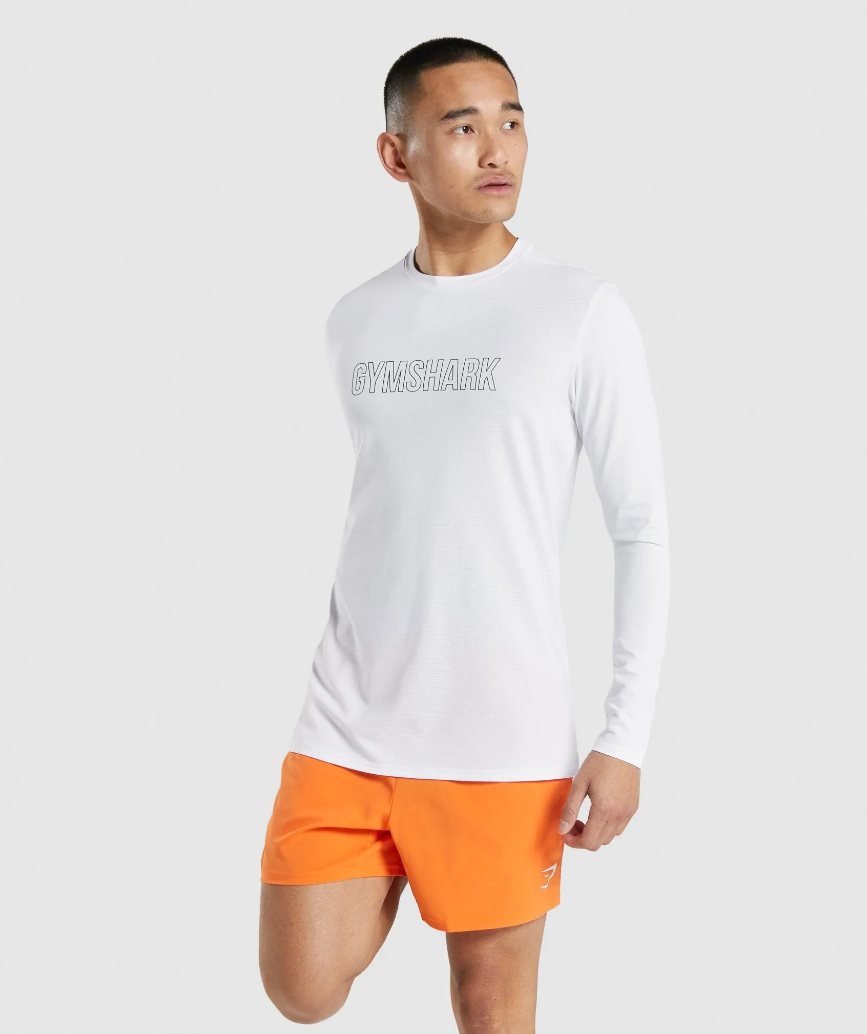 Gymshark Arrival Graphic Long Sleeve T-Shirt - White sold by Gymshark