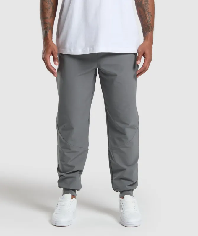 Gymshark Ease Woven Joggers - Pitch Grey sold by Gymshark