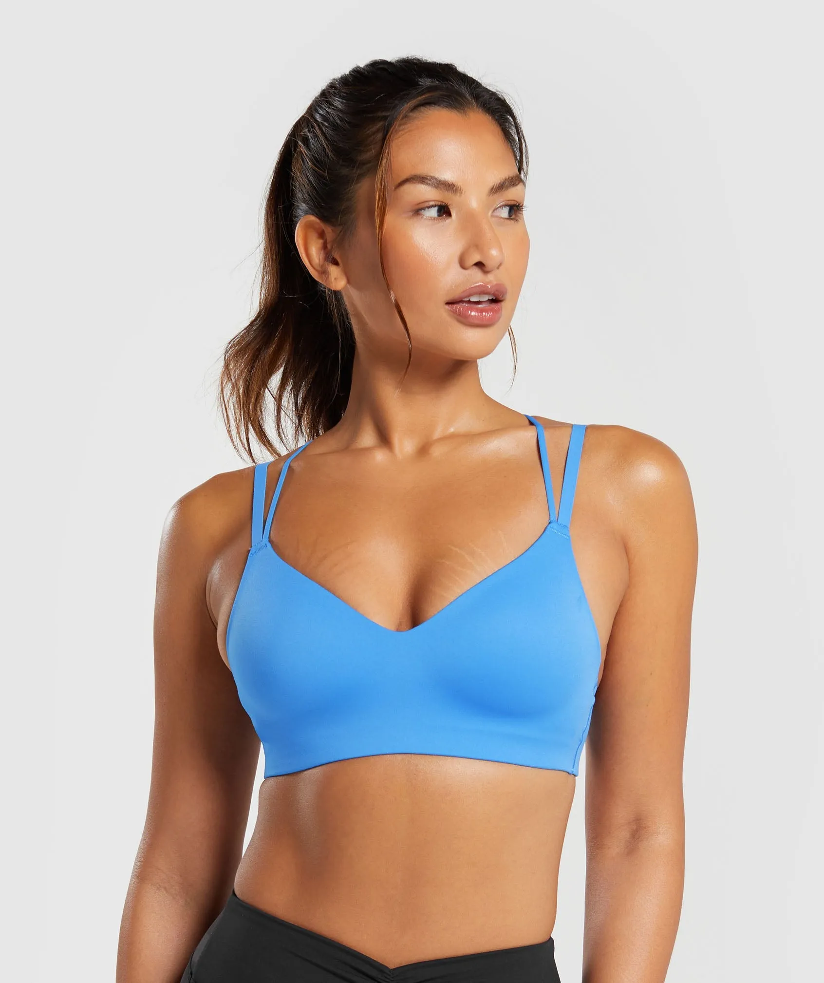Gymshark Strappy Back Light Support Sports Bra - Lats Blue sold by Gymshark