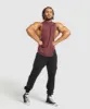 Gymshark React Drop Arm Tank - Burgundy Brown sold by Gymshark