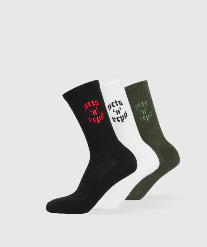 Gymshark Sets and Reps 3pk Crew Socks - White/Winter Olive/Black sold by Gymshark