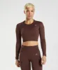 Gymshark Adapt Marl Seamless Long Sleeve Crop Top - Archive Brown/Cherry Brown sold by Gymshark