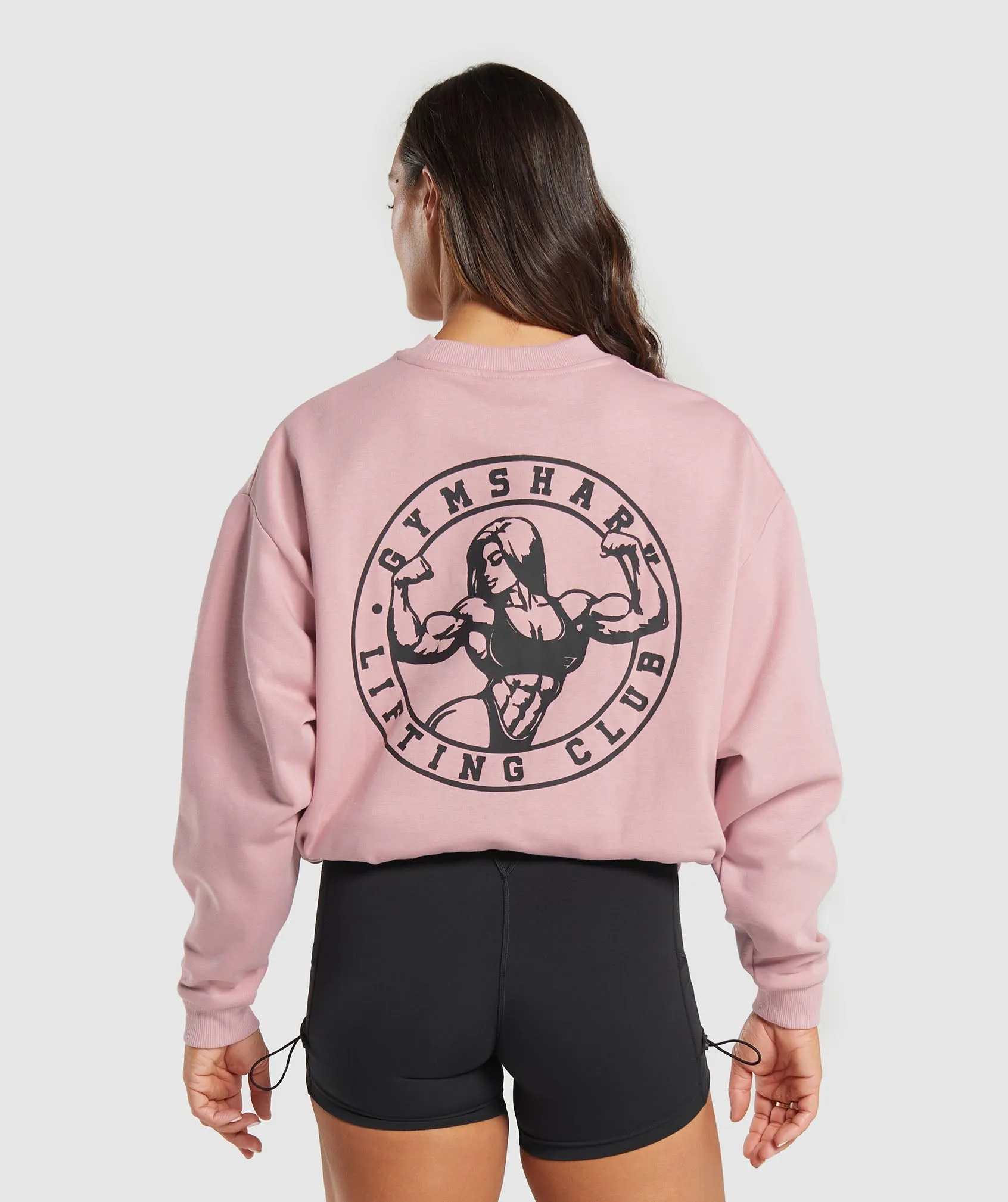 Gymshark Strong Girl Lifting Club Oversized Graphic Crew - Light Pink sold by Gymshark