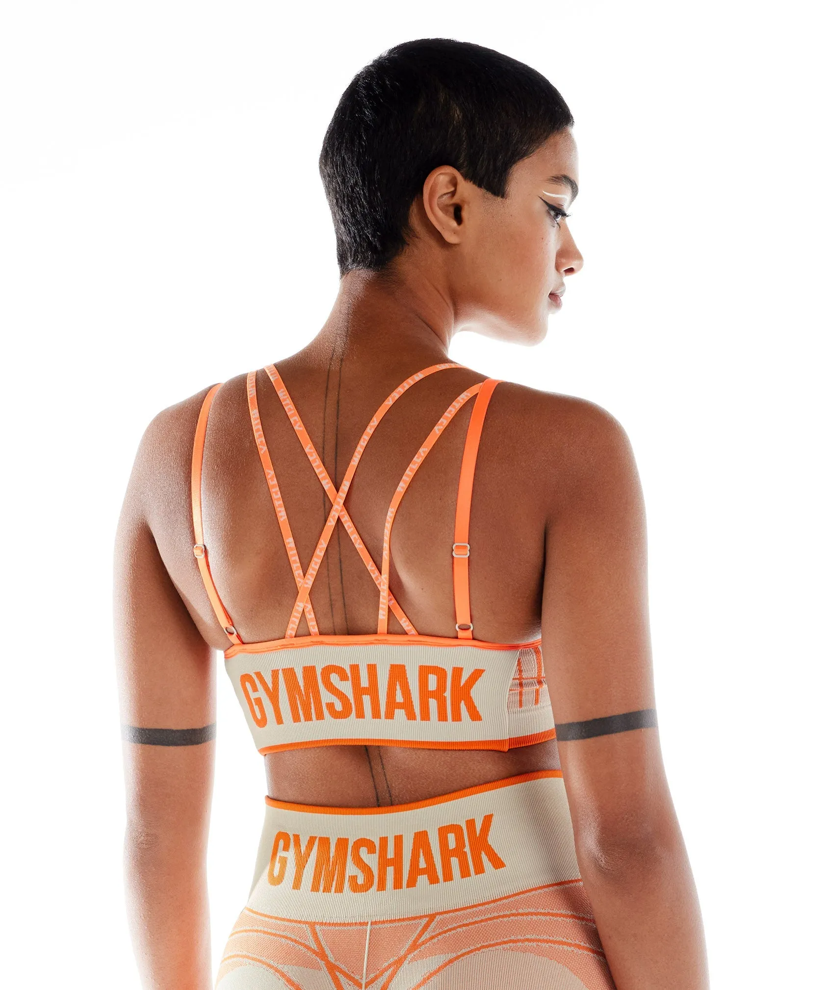 Gymshark Wtflex Linear Seamless Sports Bra - Pebble Grey/Orange/Coconut White sold by Gymshark
