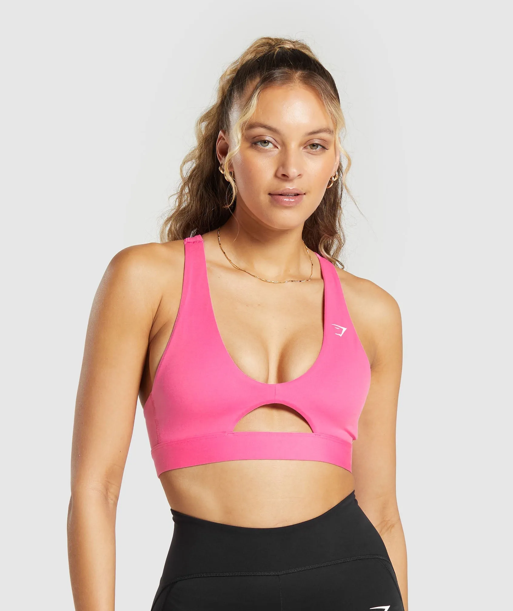 Gymshark Peek A Boo Sports Bra - Fetch Pink sold by Gymshark