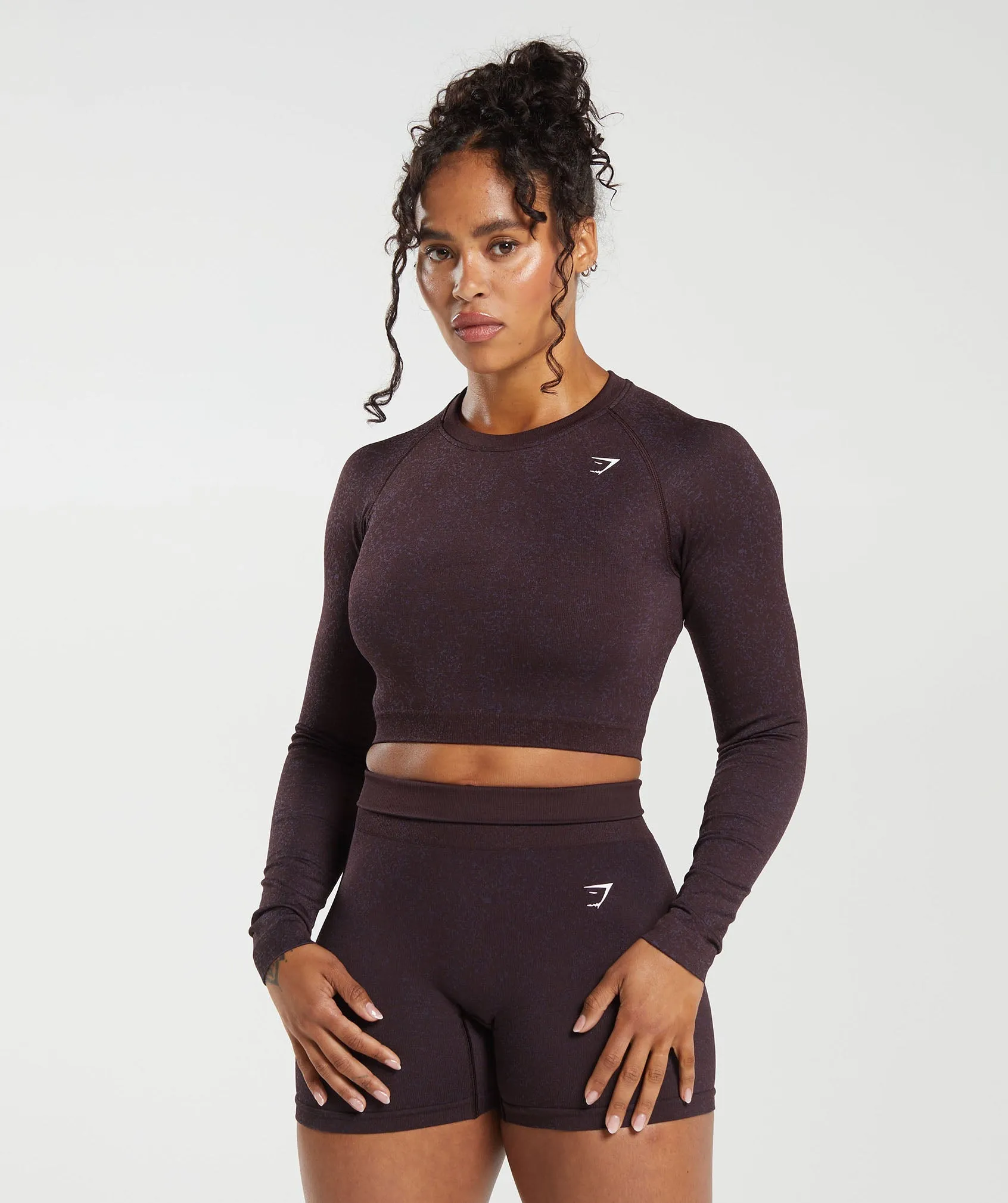Gymshark Adapt Fleck Seamless Long Sleeve Crop Top - Plum Brown/Dewberry Purple sold by Gymshark