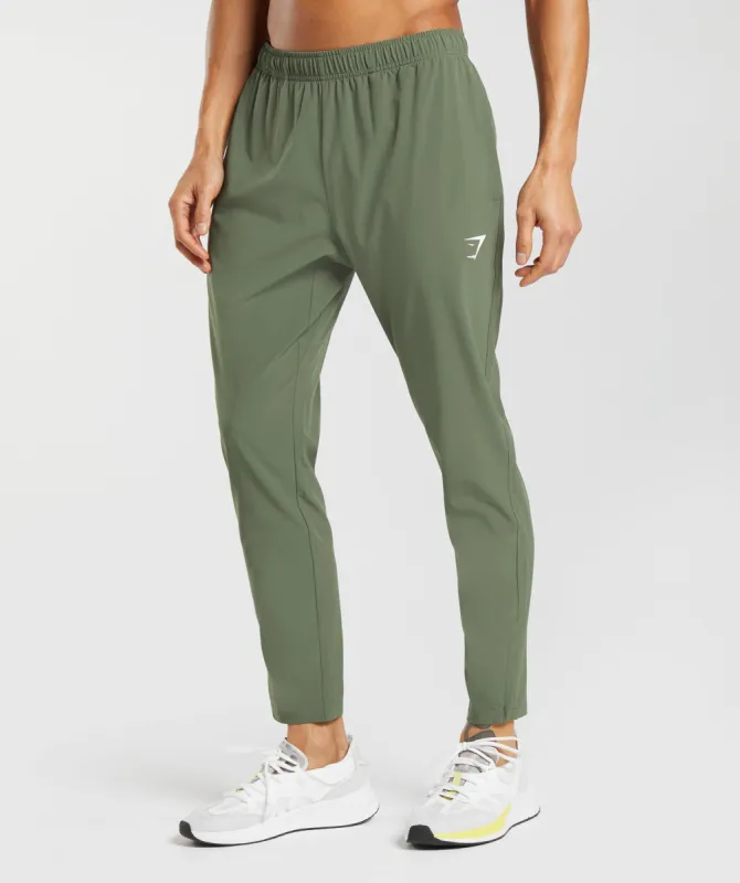 Gymshark Arrival Woven Joggers - Core Olive sold by Gymshark