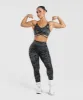 GS Power Strappy Sports Bra - Dark Grey sold by Gymshark