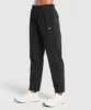 Gymshark Tapered Woven Pants - Black sold by Gymshark