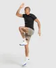 Gymshark Arrival 7" Shorts - Linen Brown sold by Gymshark