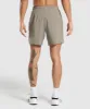 Gymshark Arrival 7" Shorts - Linen Brown sold by Gymshark
