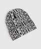 Gymshark Reverse Jacquard Beanie - Black/White sold by Gymshark