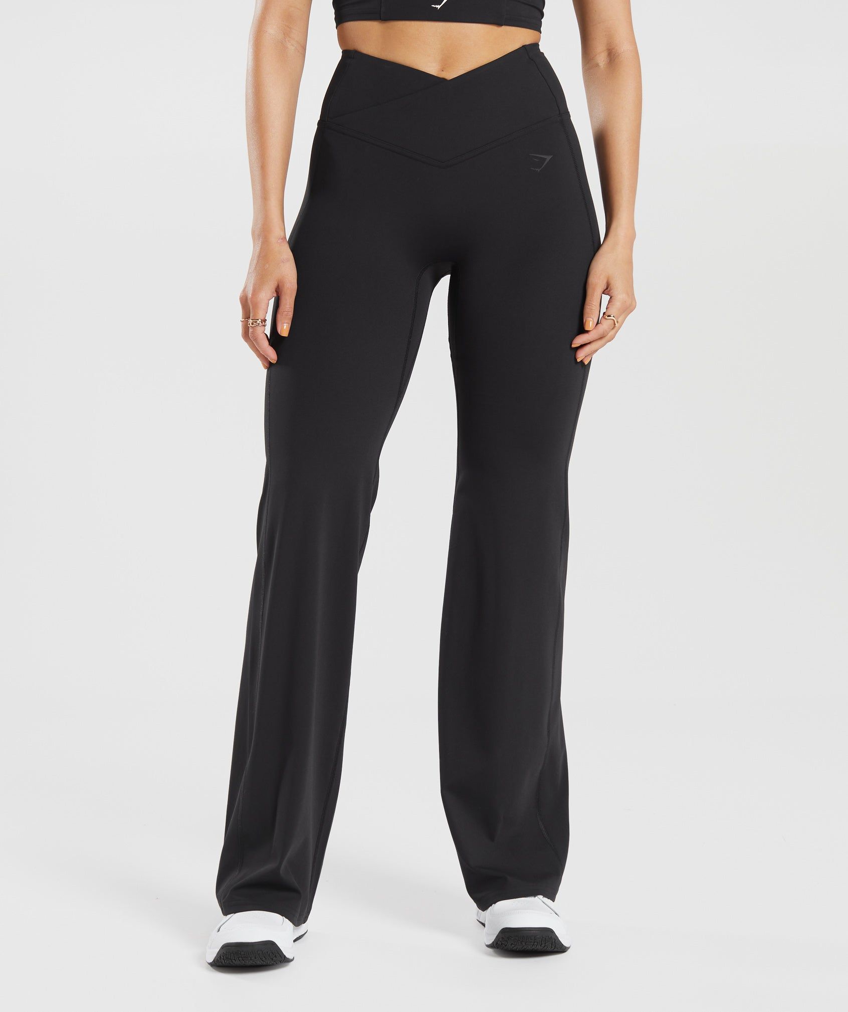 Gymshark Crossover Flared Leggings - Black sold by Gymshark