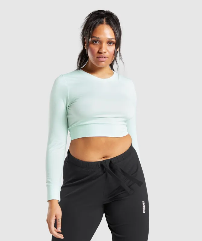 Gymshark Pause Open Back Long Sleeve Crop Top - Light Green sold by Gymshark