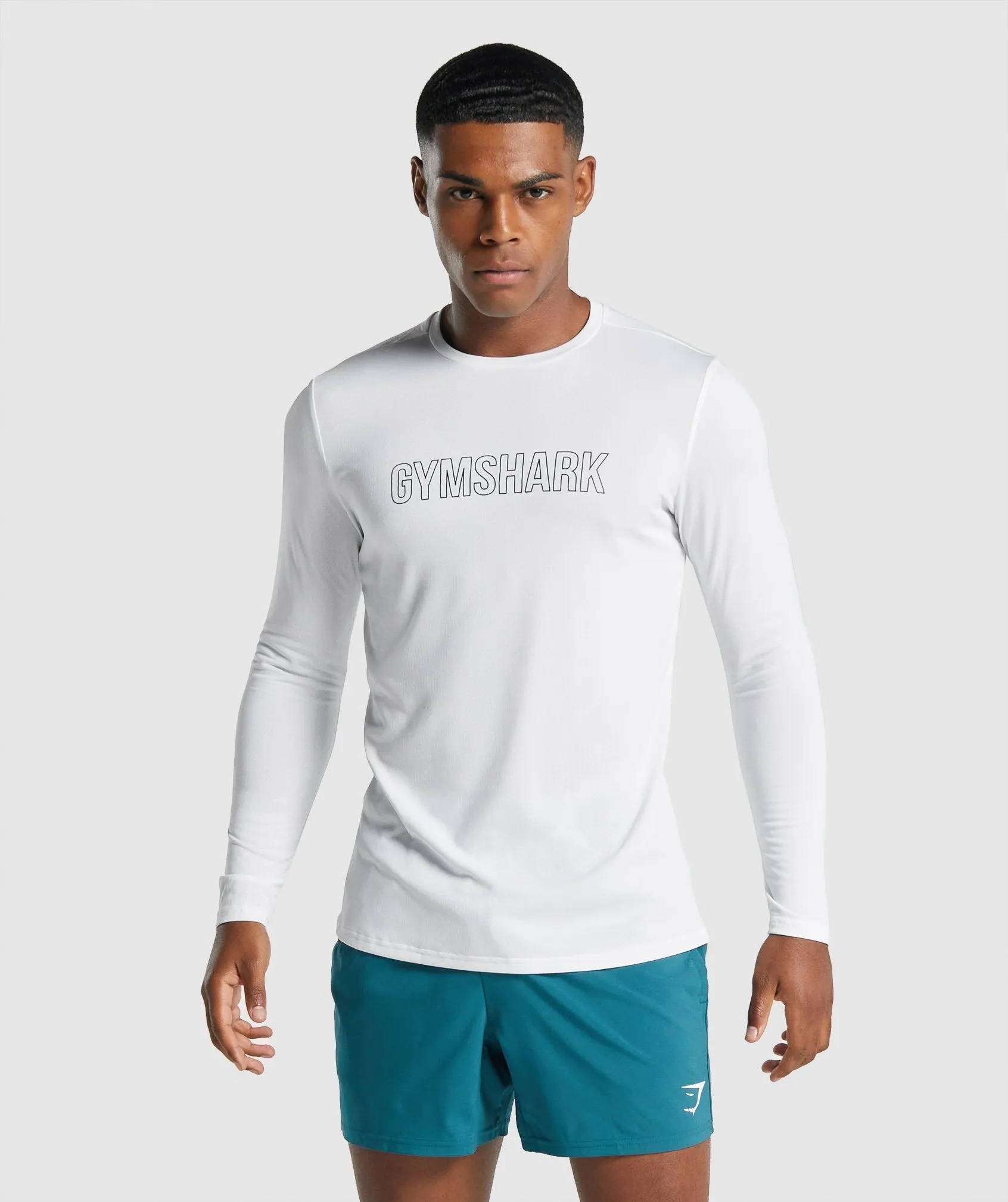 Gymshark Arrival Long Sleeve Graphic T-Shirt - White sold by Gymshark
