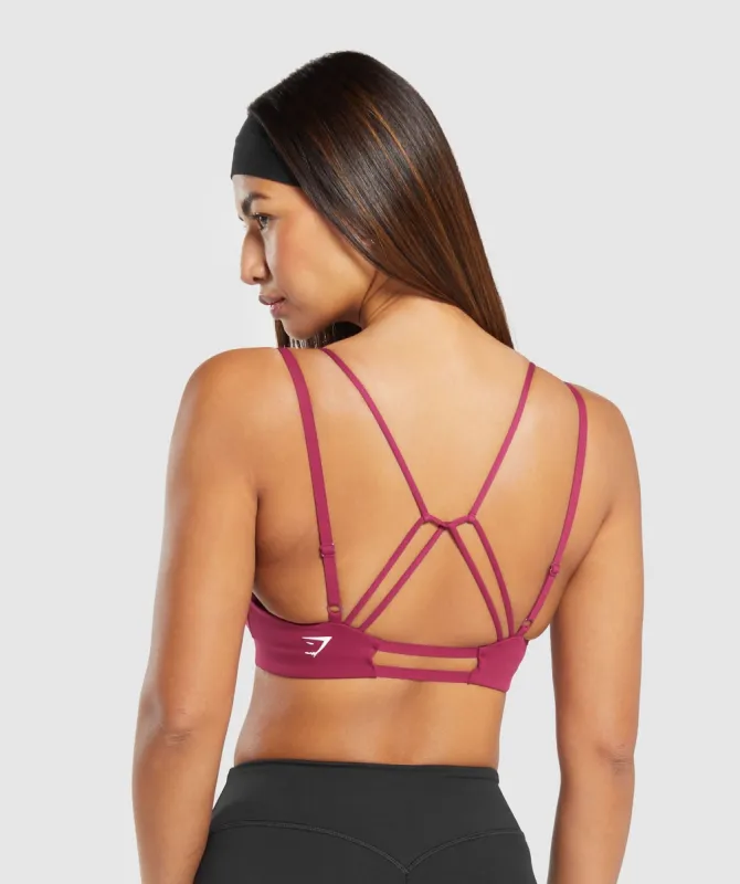 Gymshark Strappy Back Light Support Sports Bra - Raspberry Pink sold by Gymshark