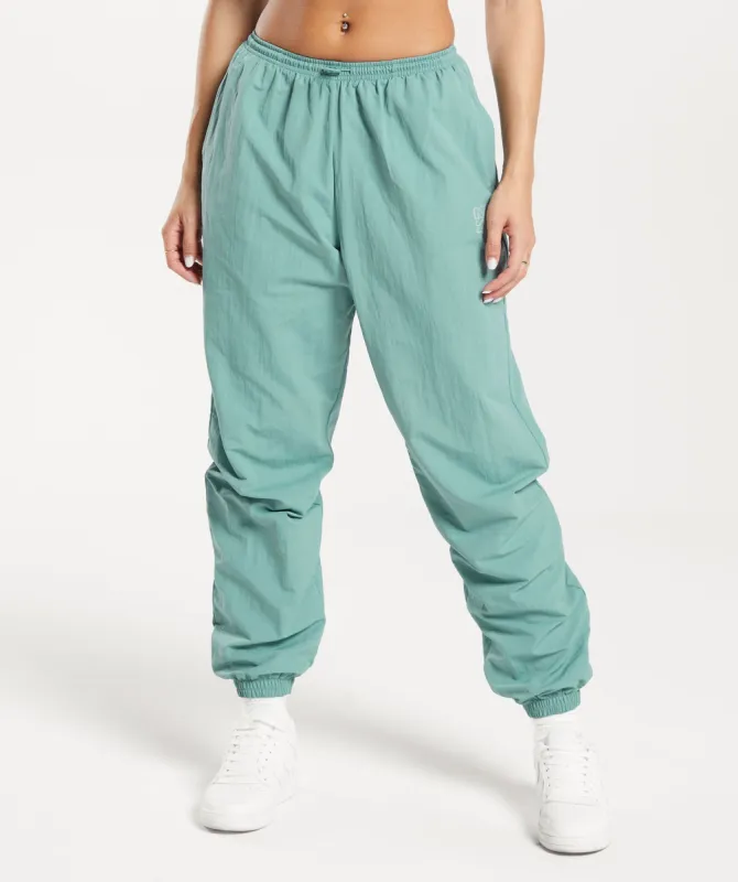 Gymshark Monogram Woven Joggers - Ink Teal sold by Gymshark