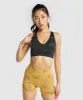 Gymshark Adapt Camo Seamless Sports Bra - Savanna | Black sold by Gymshark