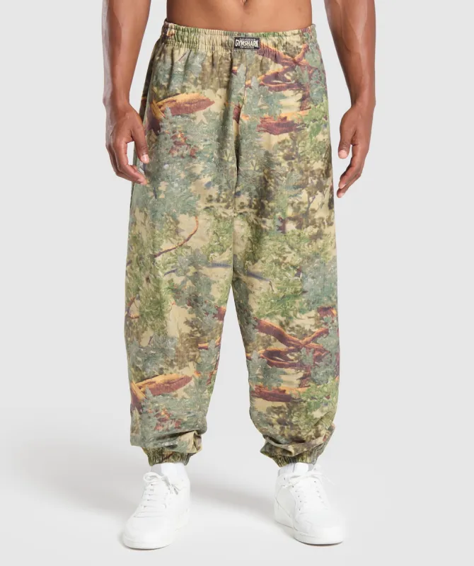 Gymshark Lifting Oversized Printed Woven Pants - Sand Beige sold by Gymshark