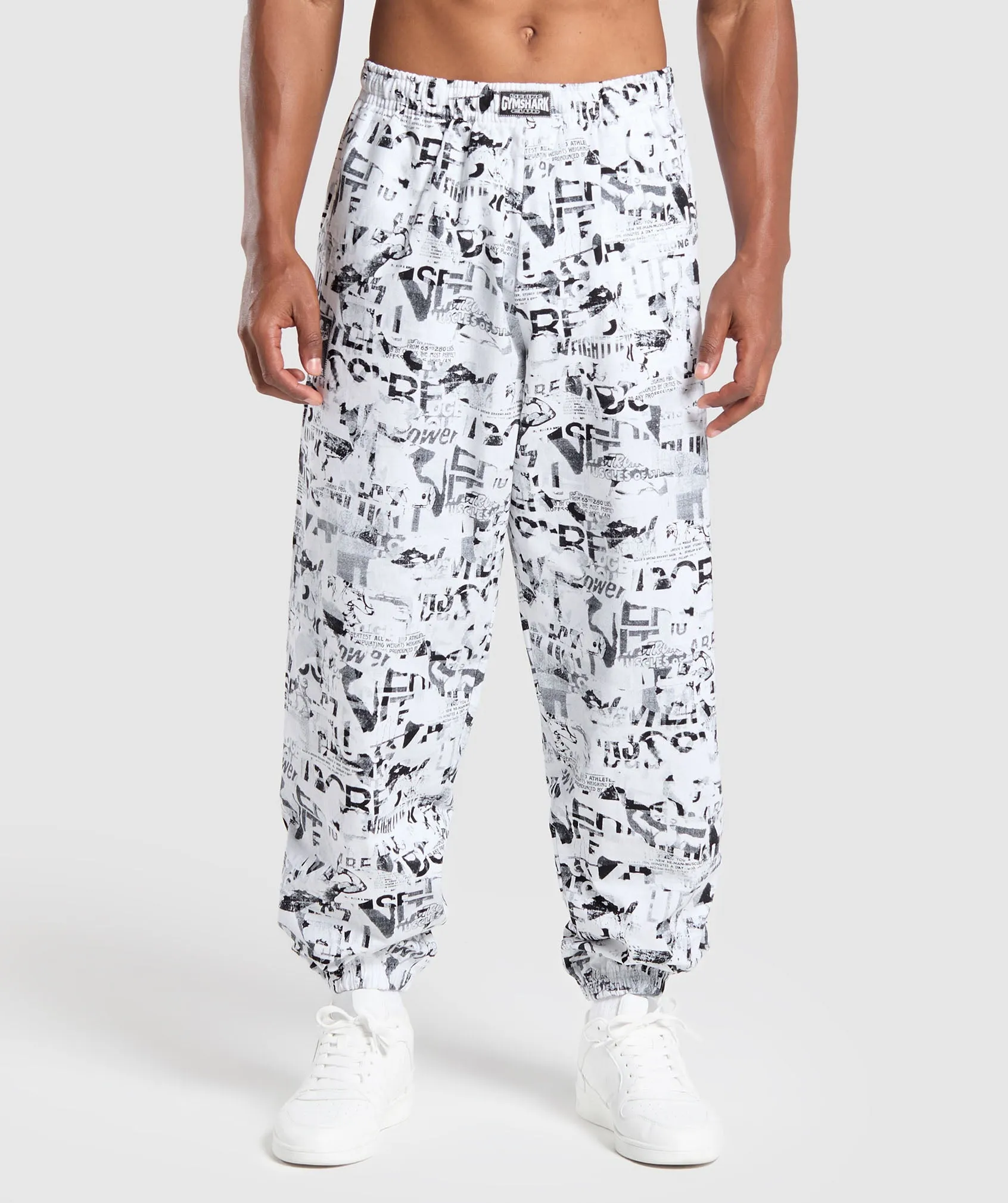 Gymshark Lifting Oversized Printed Woven Pants - White sold by Gymshark