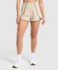 Gymshark Retro Waistband Shorts - Cream Beige/Camo Brown sold by Gymshark