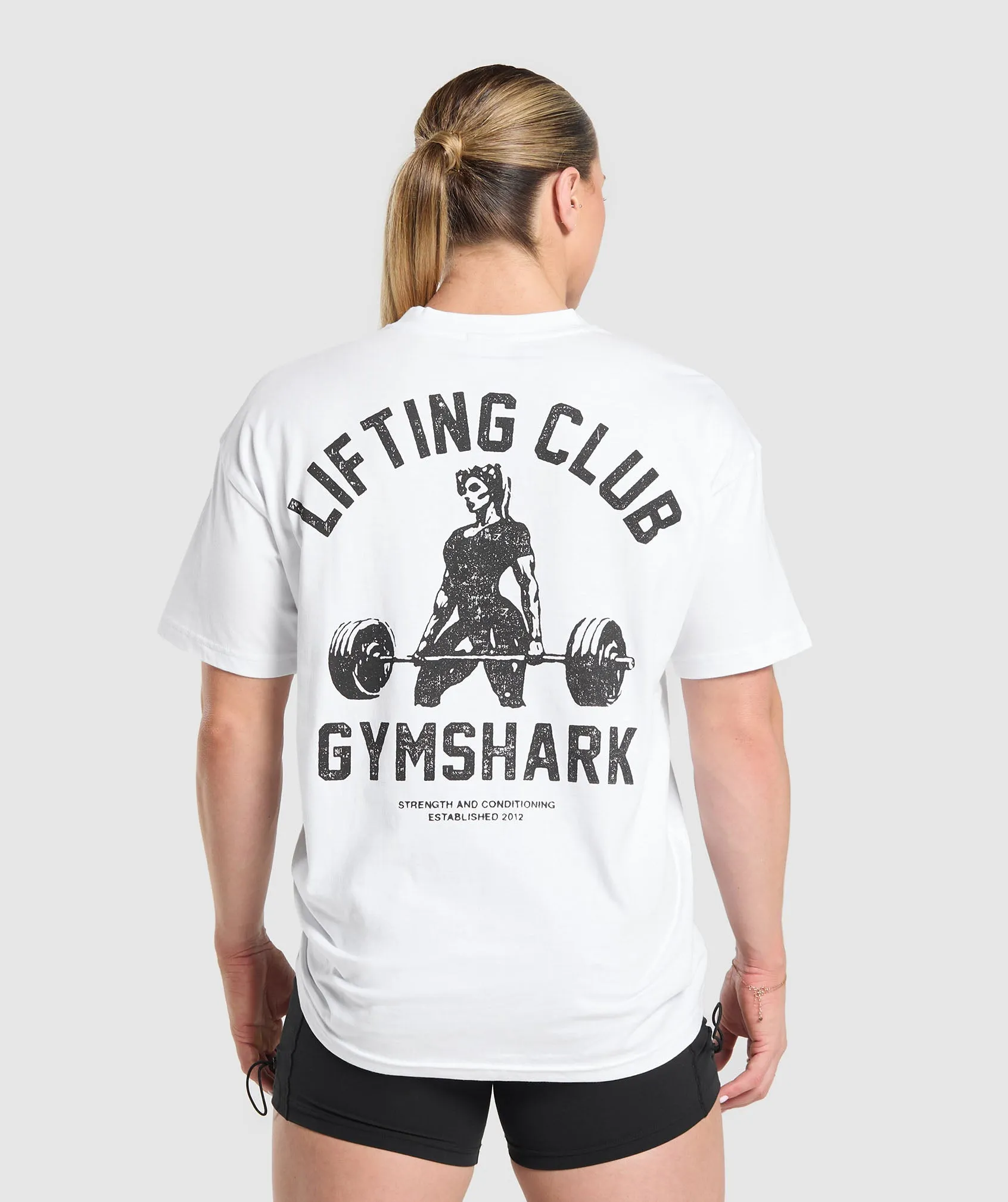 Gymshark Script Graphic Oversized T-Shirt - White sold by Gymshark