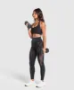 Gymshark Warp Knit Seamless Halerneck Bralette - Black/Linen Brown sold by Gymshark