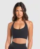 Gymshark Warp Knit Seamless Halerneck Bralette - Black/Linen Brown sold by Gymshark