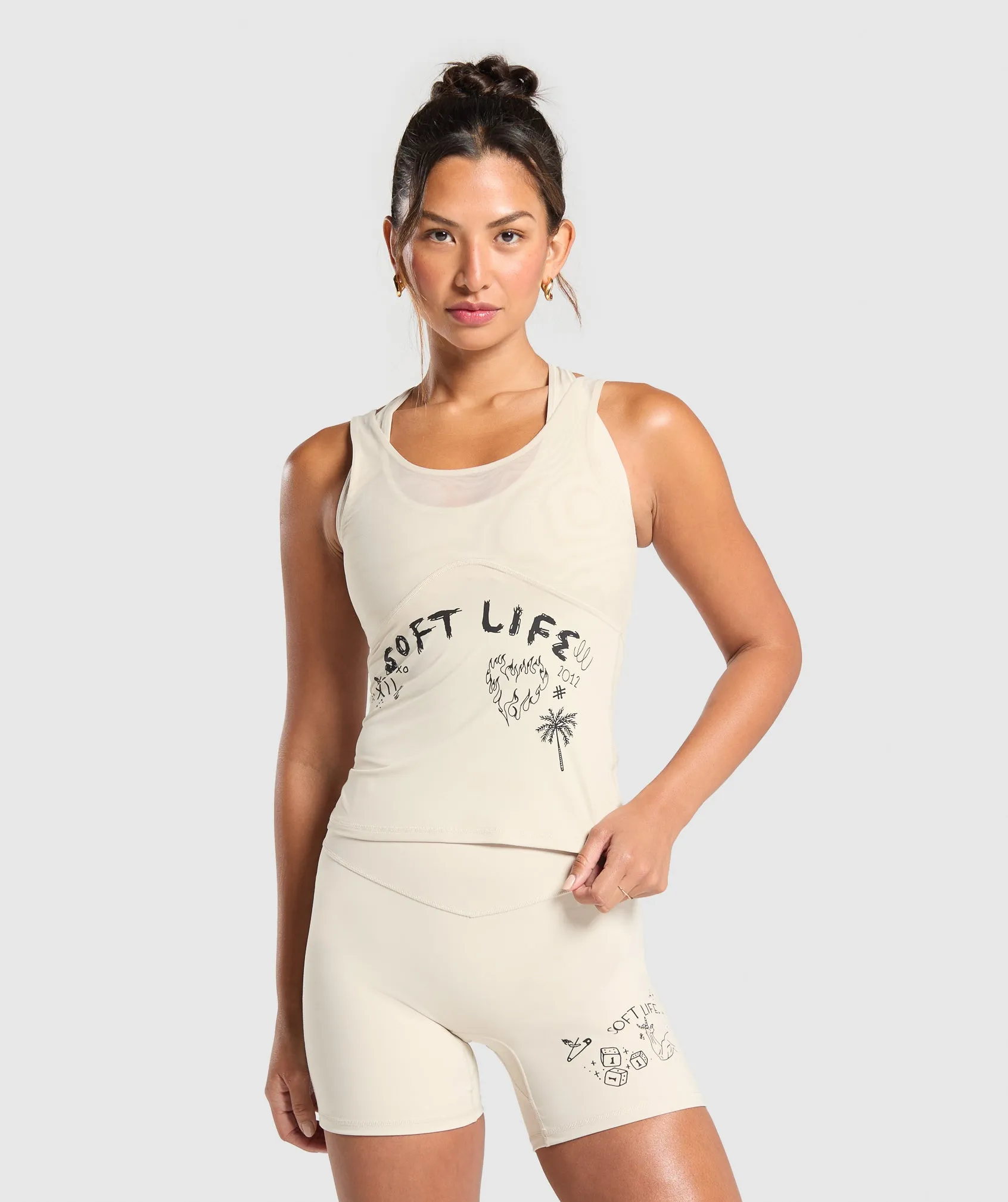 Gymshark Elevate Tattoo Graphic Tank With Shelf - Cream Beige sold by Gymshark