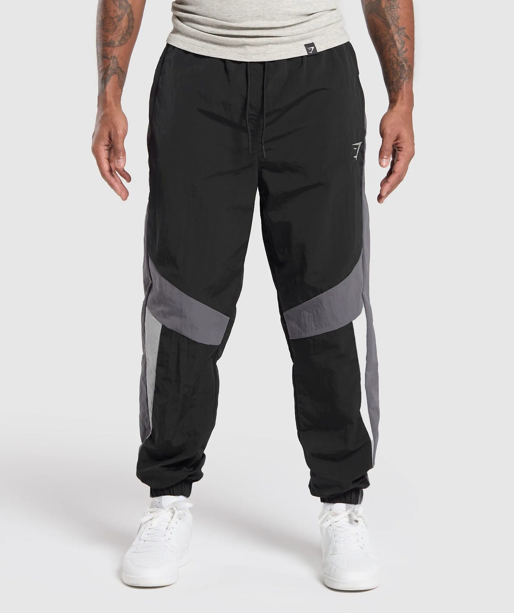 Gymshark Retro Track Pants - Black/Dark Grey/Smokey Grey sold by Gymshark