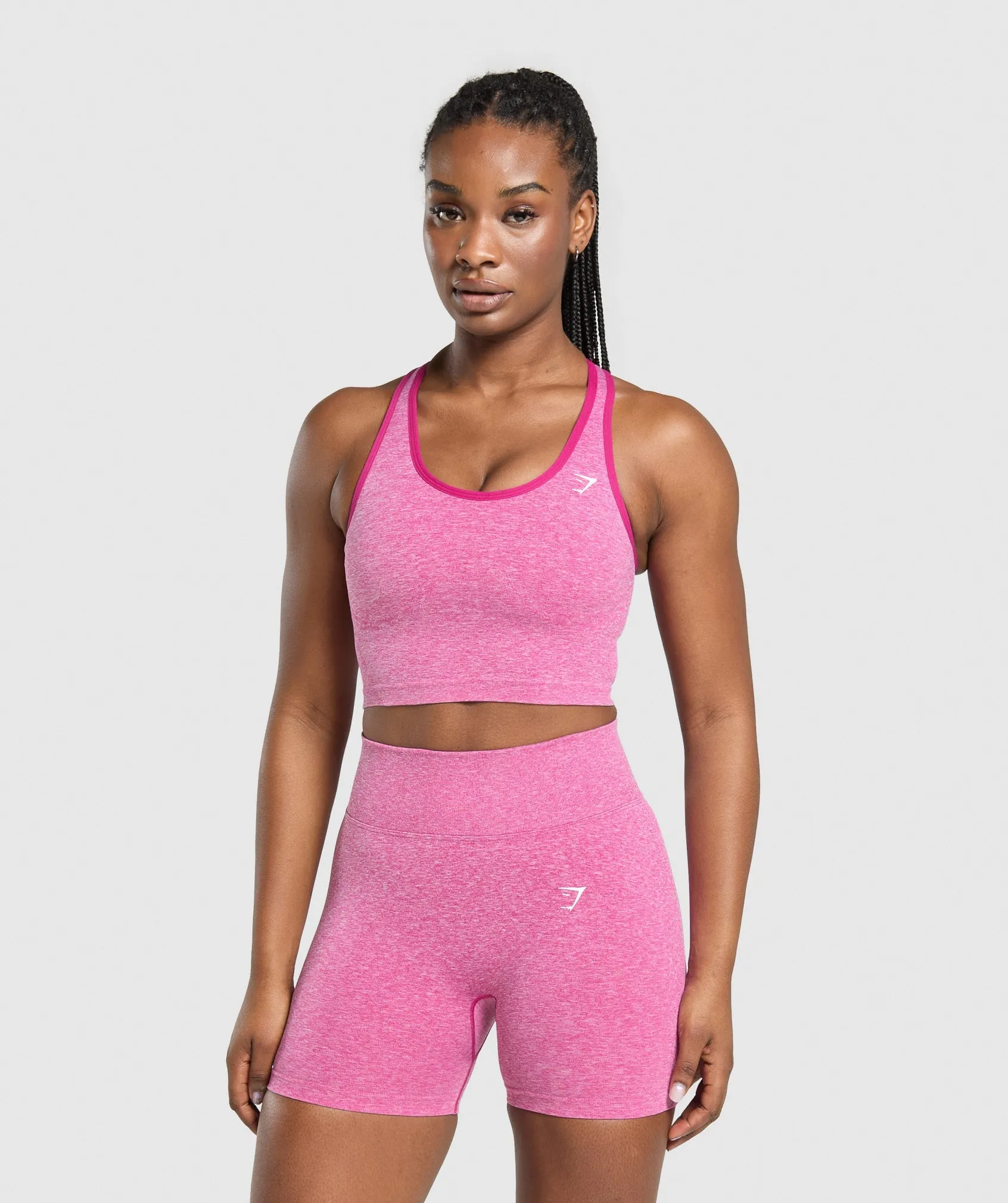 Gymshark Lift Seamless Midi Tank With Shelf - Winning Pink/White Marl sold by Gymshark