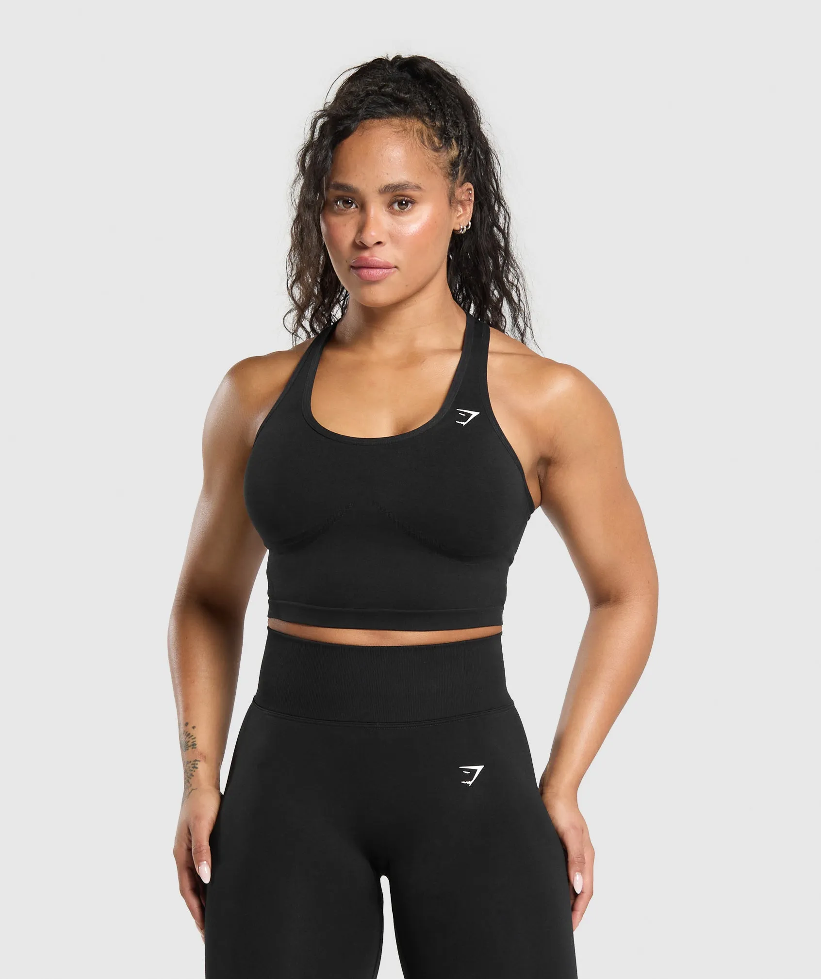 Gymshark Lift Seamless Midi Tank With Shelf - Black/Black Marl sold by Gymshark