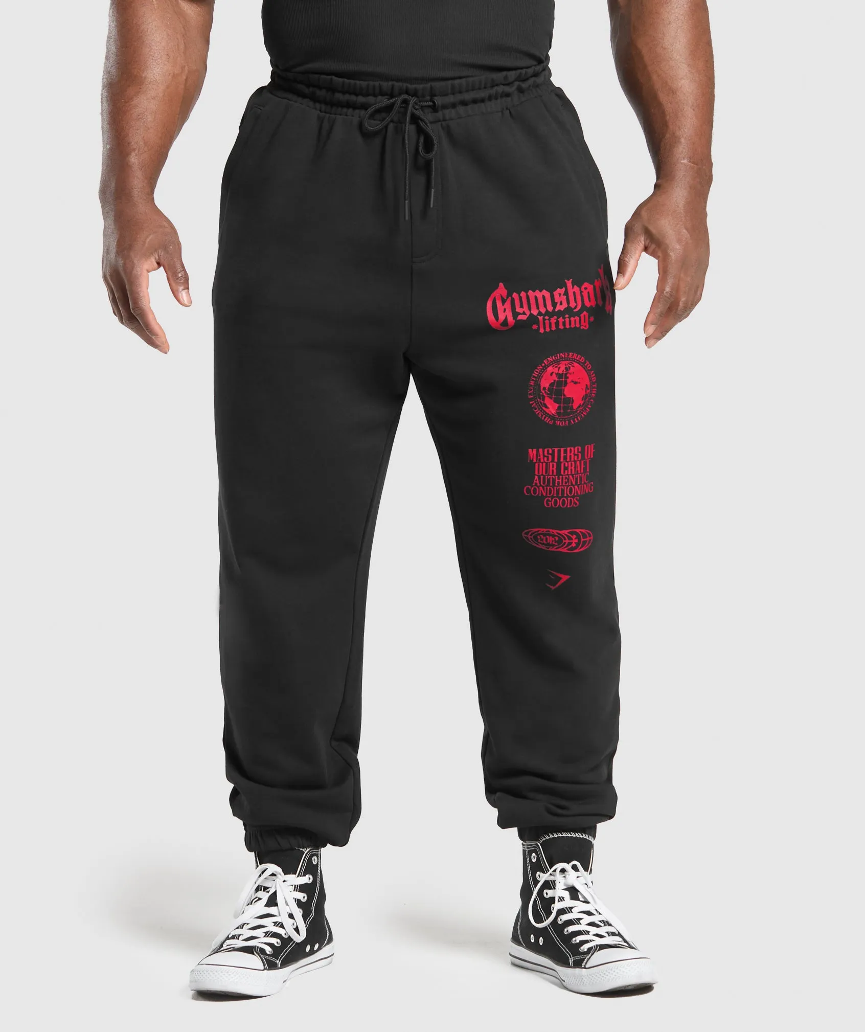 Gymshark Global Lifting Oversized Essential Joggers - Black/Conditioning Red sold by Gymshark