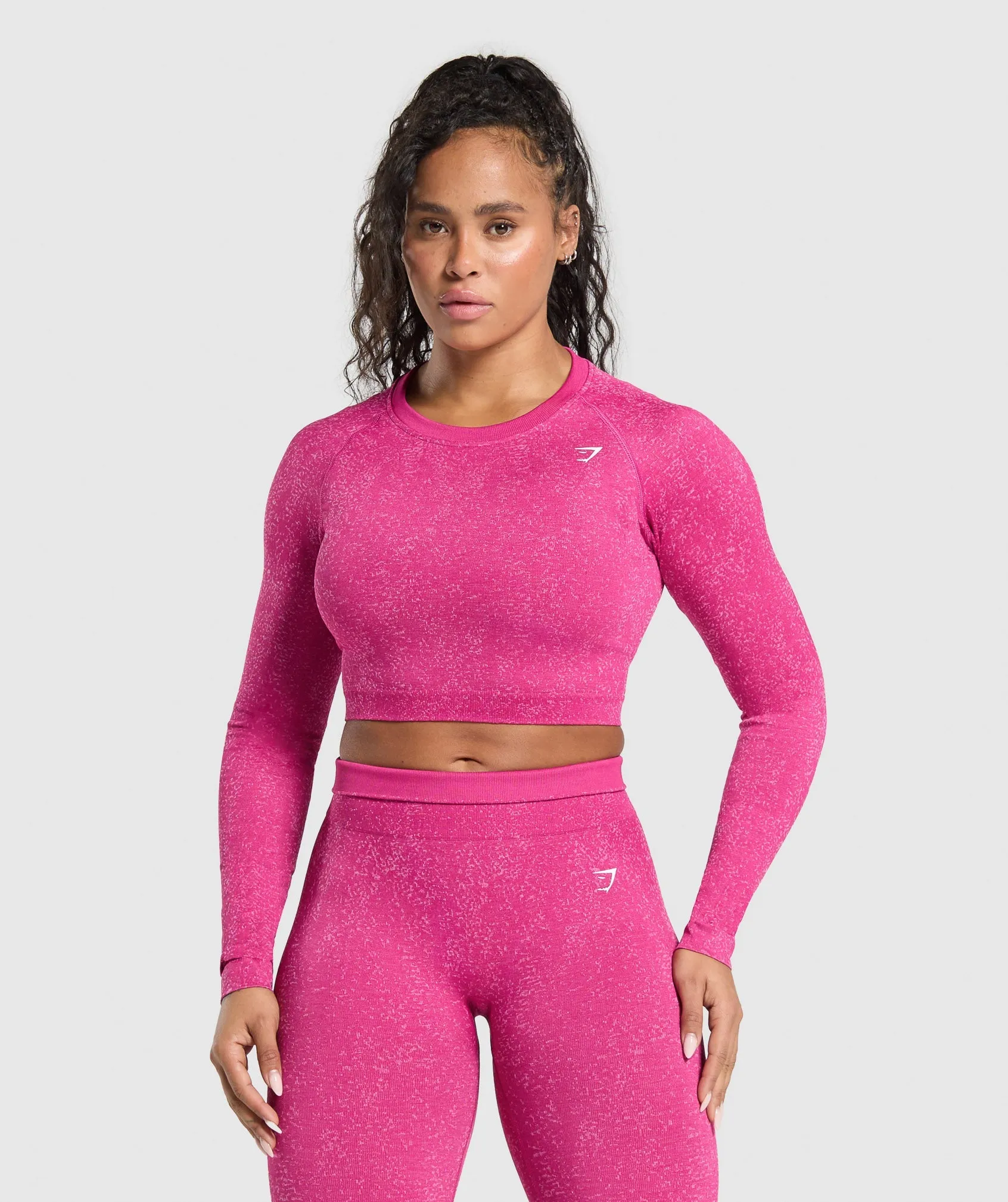 Gymshark Adapt Fleck Seamless Long Sleeve Crop Top - Winning Pink/Sour Pink sold by Gymshark