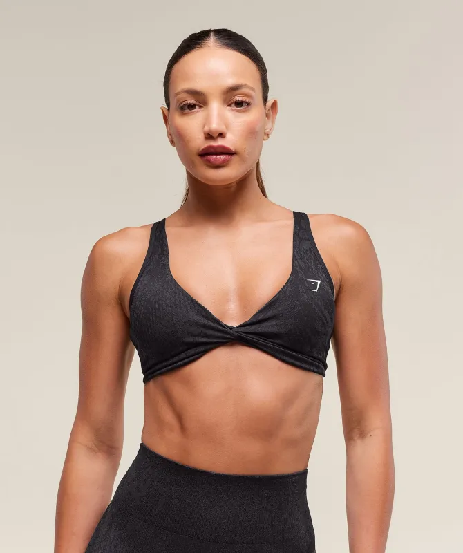 Gymshark Adapt Animal X Whitney Seamless Twist Front Bra - Asphalt Grey/Black sold by Gymshark