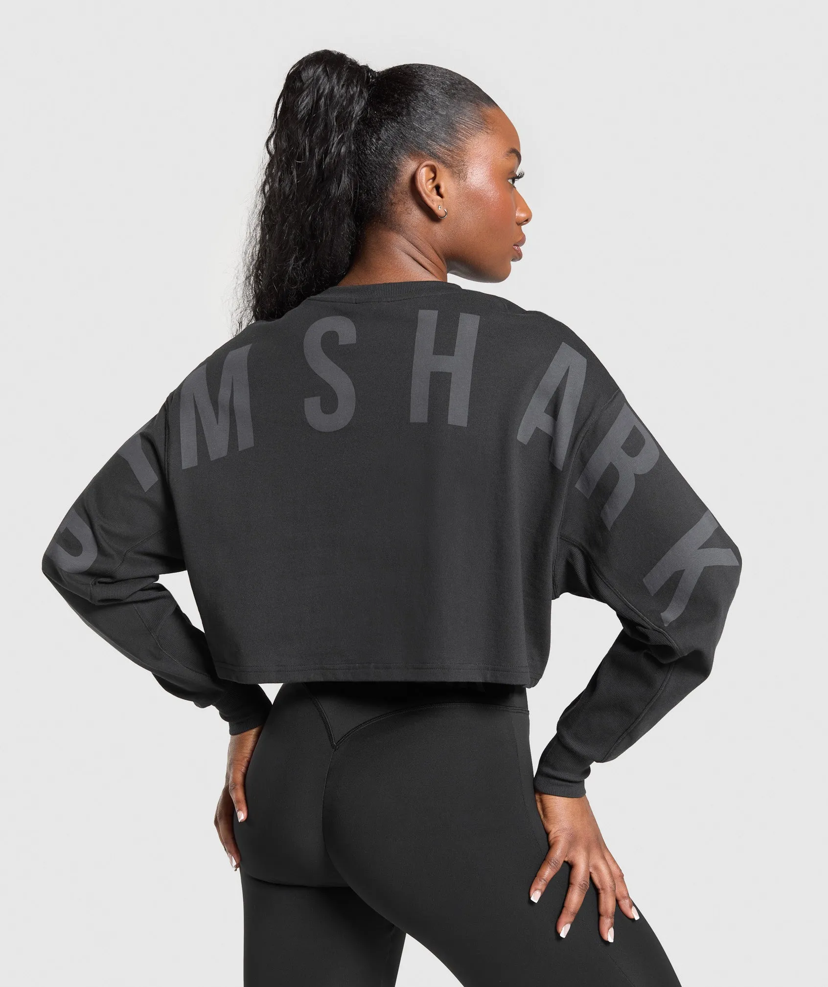 Gymshark Gymshark Wordmark Graphic Long Sleeve Top - Black sold by Gymshark