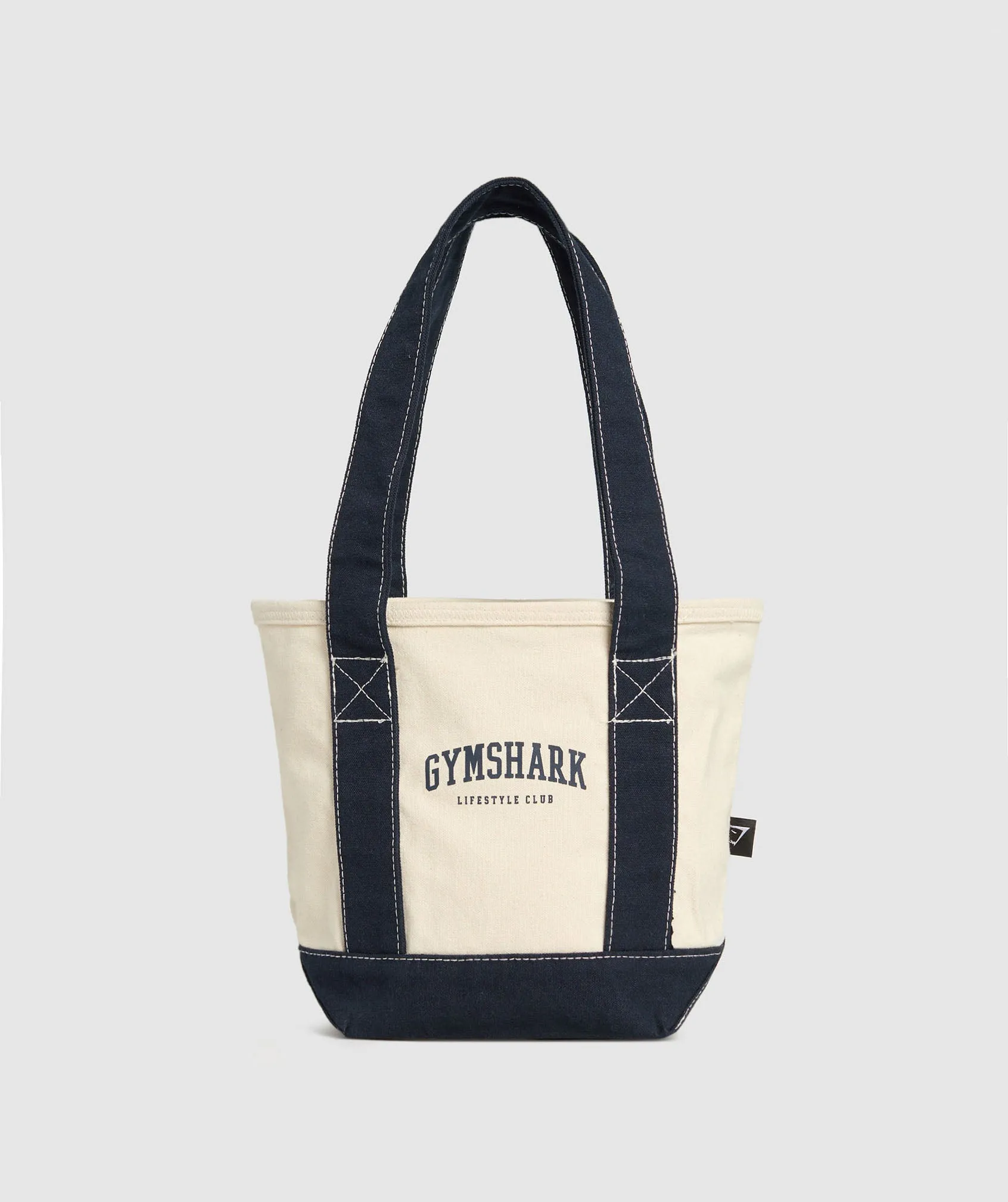 Gymshark Collegiate Mini Tote - Oat White/Heavy Blue sold by Gymshark