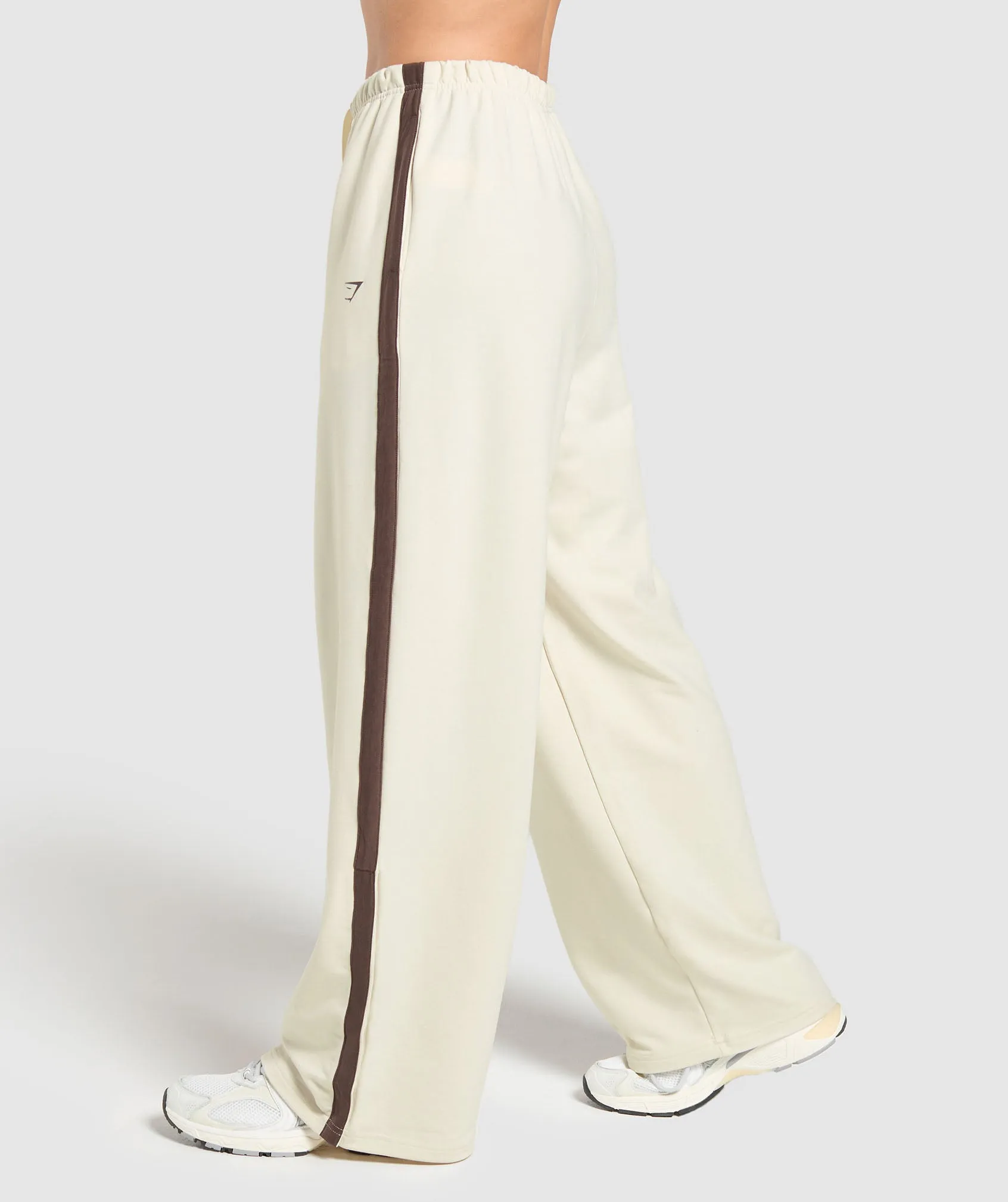 Gymshark Retro Stripe Snap Pant - Oat White/Archive Brown sold by Gymshark