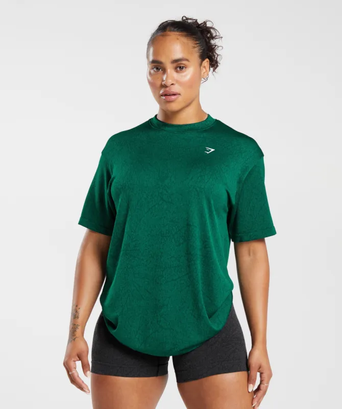 Gymshark Adapt Pattern Seamless Loose Top - Forest Green/Rich Green sold by Gymshark