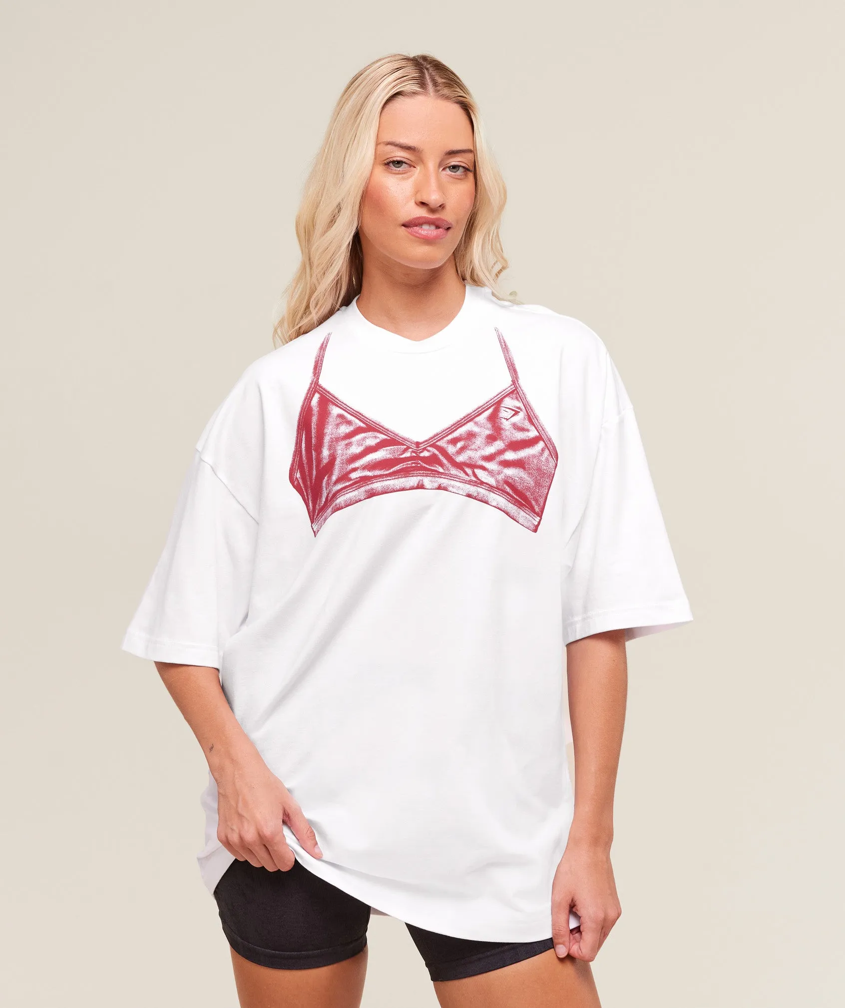 Gymshark Minimal Bra Graphic Oversized T-Shirt - White/Conditioning Red sold by Gymshark