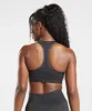 Gymshark Adapt Camo Seamless Sports Bra - Black/Onyx Grey sold by Gymshark