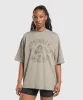 Gymshark Lifting Girl Graphic Oversized Tee - Linen Brown sold by Gymshark