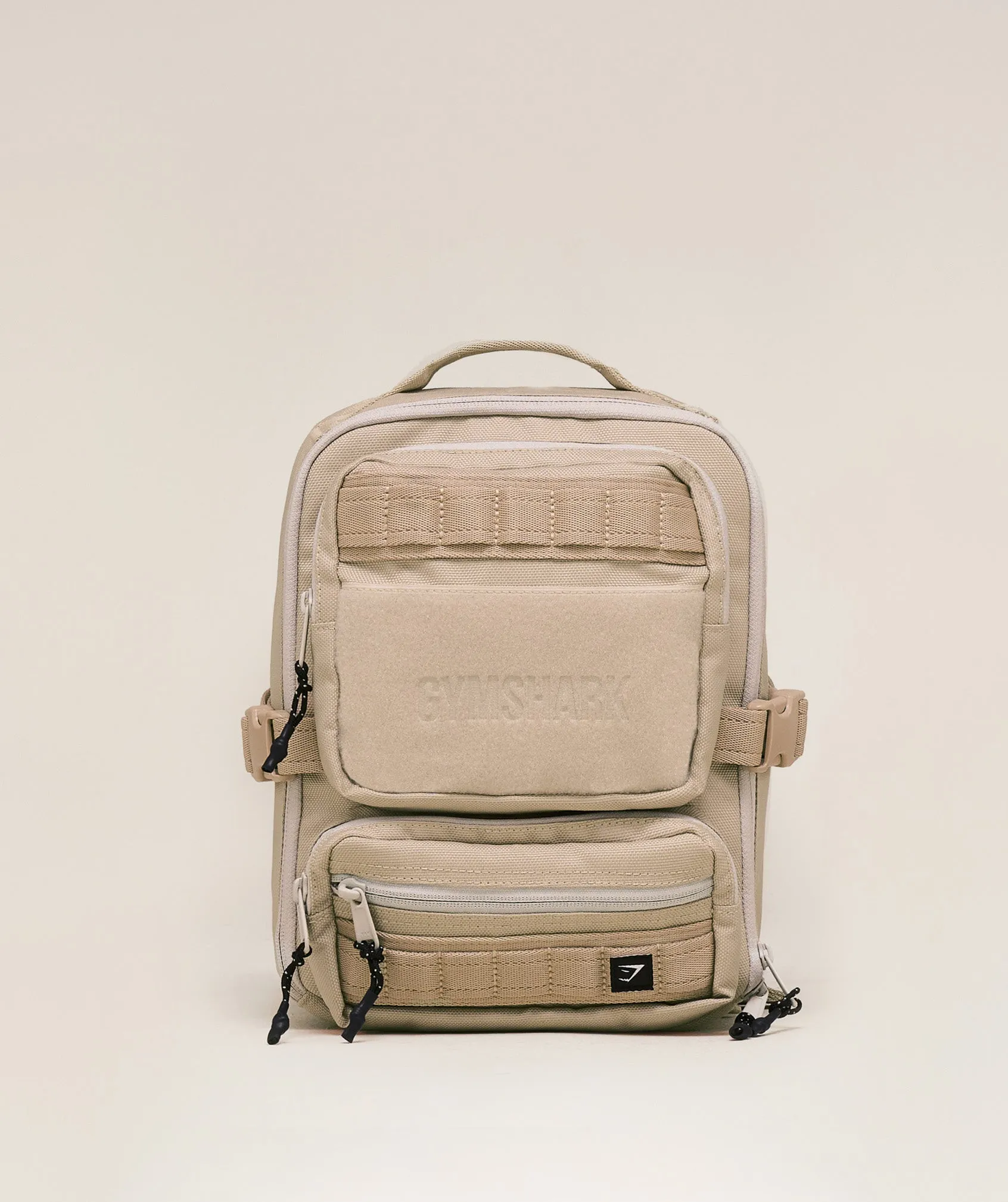 Gymshark Mini Tactical Backpack - Vanilla Beige/Pebble Grey sold by Gymshark